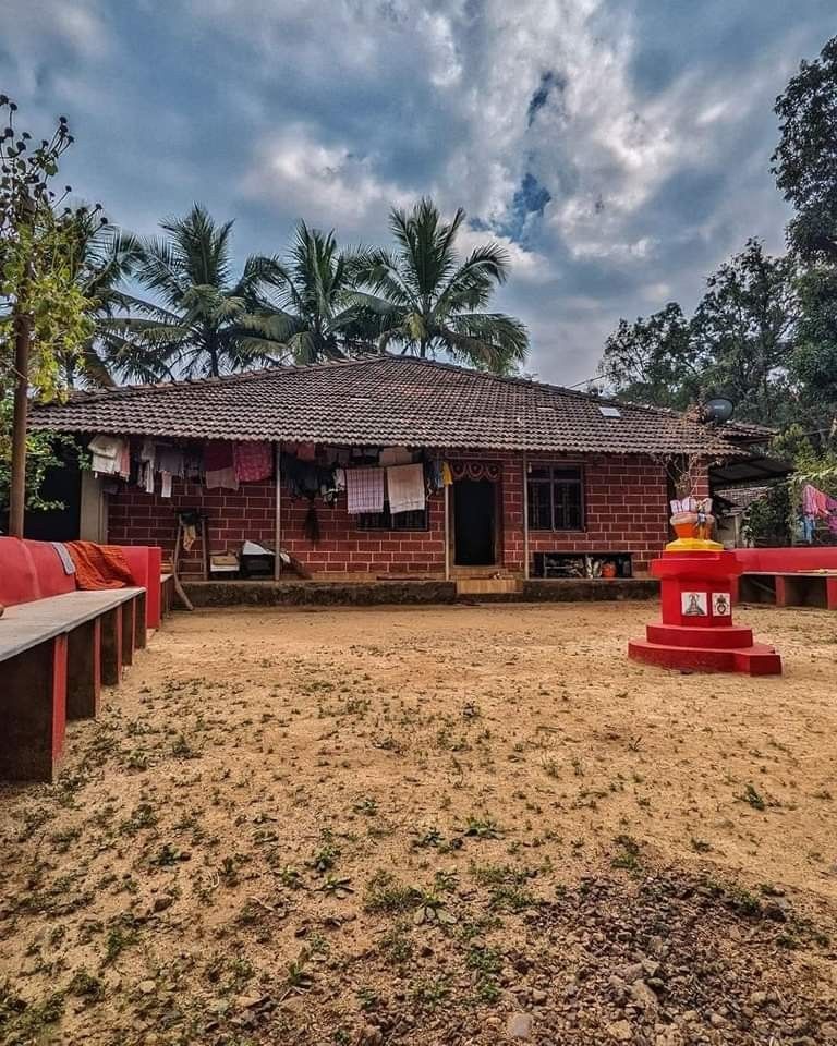 Traditional Village Courtyard surrounded by the landscape and homes of rural Kokan