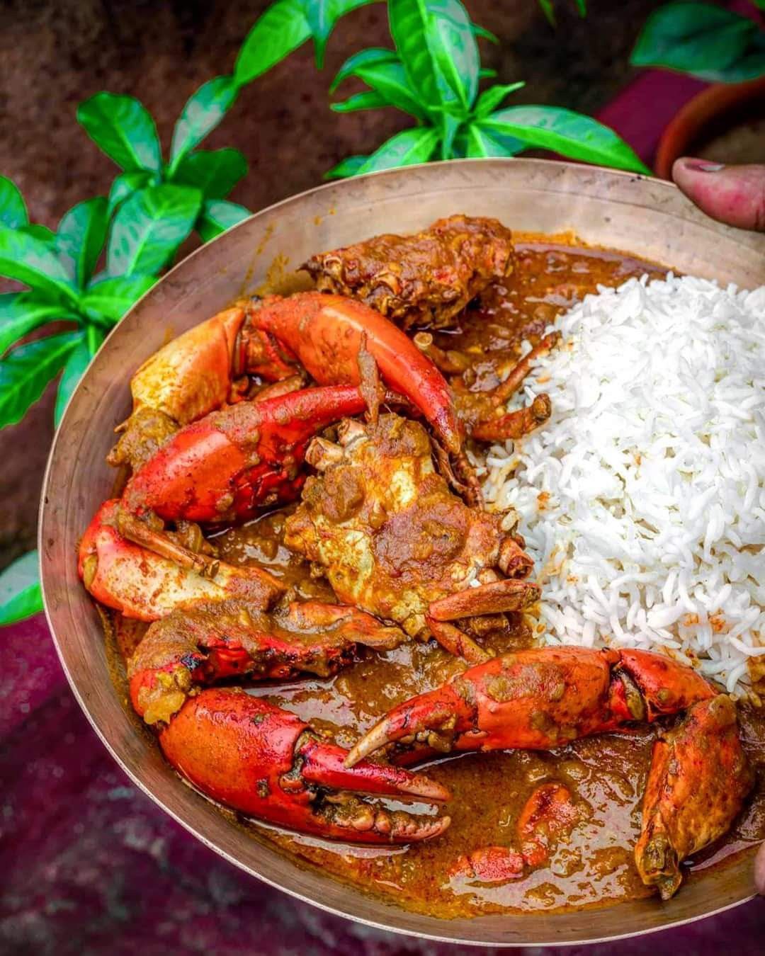 Traditional Kokan speciality Crab Curry presented in its local setting