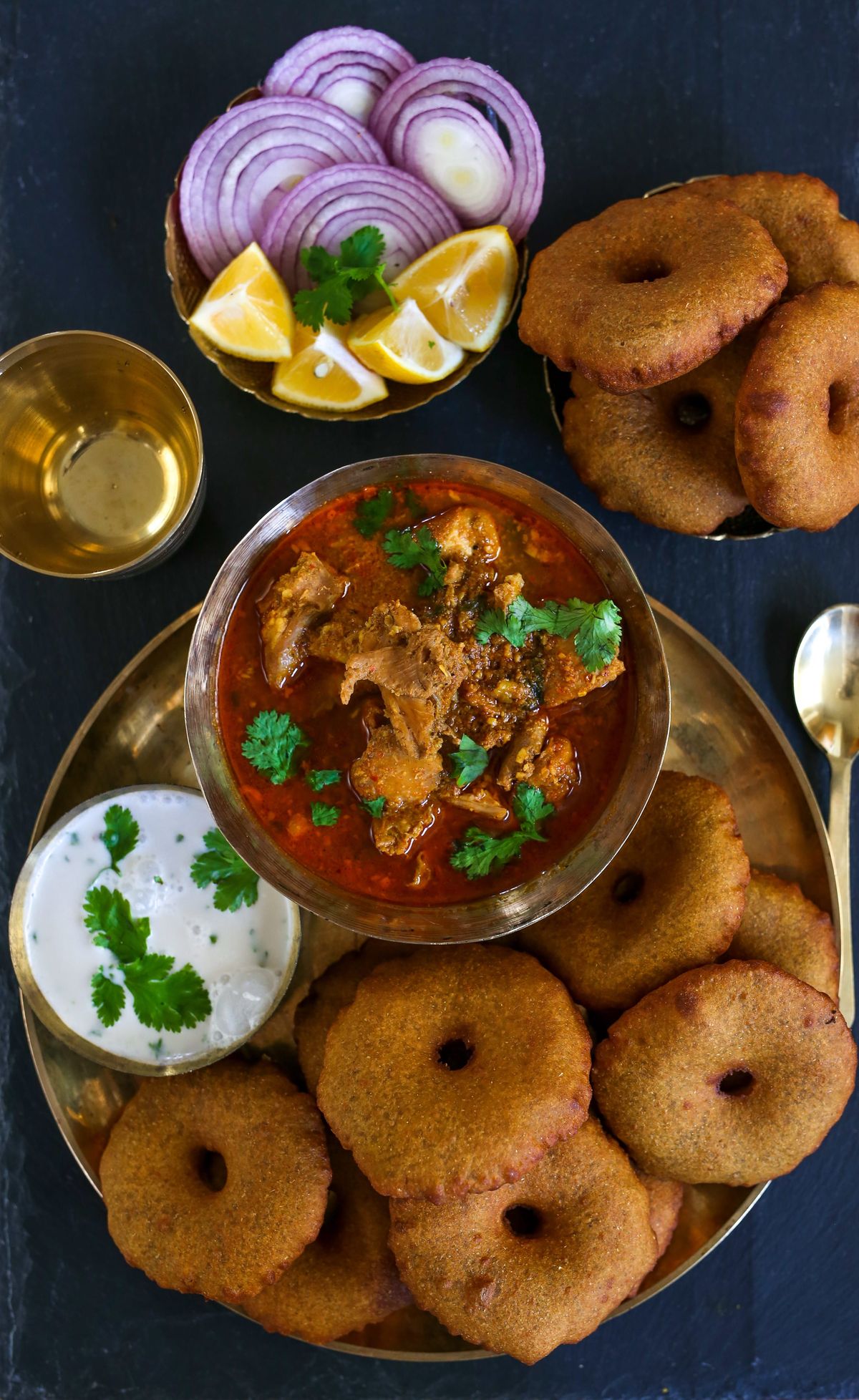 Traditional Kokan speciality Kombdi Vade presented in its local setting